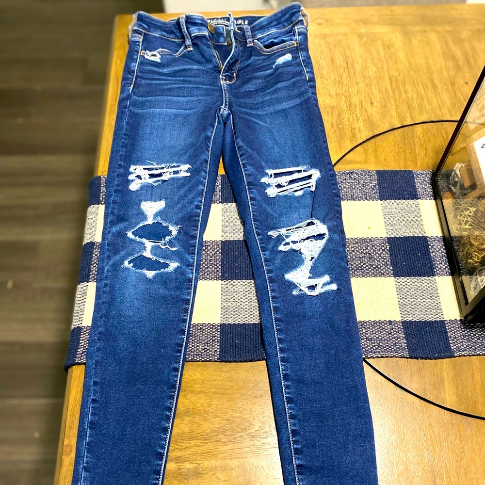 American eagle dark ripped covered jeans